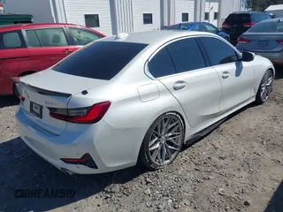 2019 BMW 3 Series 330i with VIN WBA5R1C5XKAJ99366, listed as a IAAI auction lot 41880445 with 48,052 mi miles and . Bid and sale history available at DreamBid. Image 4.