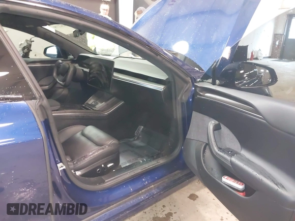 2021 Tesla Model S Plaid with VIN 5YJSA1E6XMF439884, listed as a IAAI auction lot 41622750 with Not provided miles and . Bid and sale history available at DreamBid. Image 5.