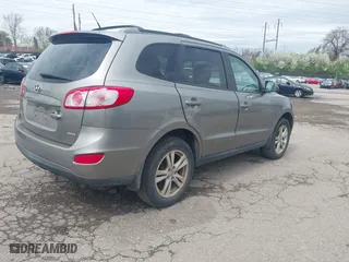 2012 Hyundai Santa Fe SE with VIN 5XYZHDAG4CG113063, listed as a IAAI auction lot 41971620 with 228,796 mi miles. Bid and sale history available at carsss.com. Image 4.