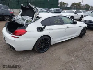 2014 BMW 6 Series 650i with VIN WBA6B2C55ED129596, listed as a IAAI auction lot 41927727 with 999,999 mi miles. Bid and sale history available at carsss.com. Image 4.