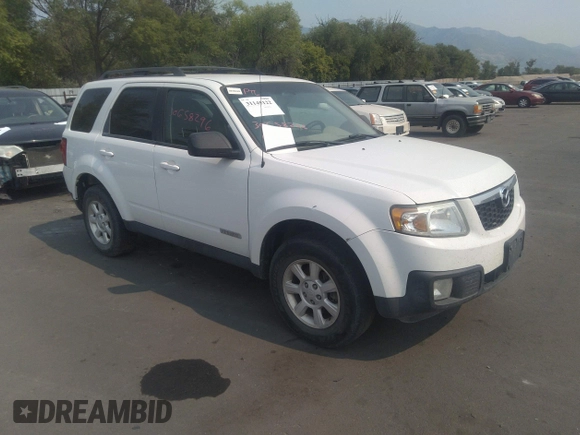2008 Mazda Tribute Touring with VIN 4F2CZ96138KM32735, listed as a IAAI auction lot 31145122 with 206,608 mi miles and . Bid and sale history available at DreamBid. Image 1.