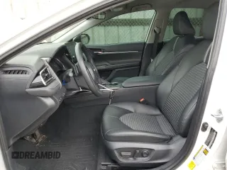 2023 Toyota Camry SE with VIN 4T1G11AK0PU779075, listed as a Copart auction lot 50642705 with 16,392 mi miles and Salvage Title. Bid and sale history available at DreamBid. Image 7.