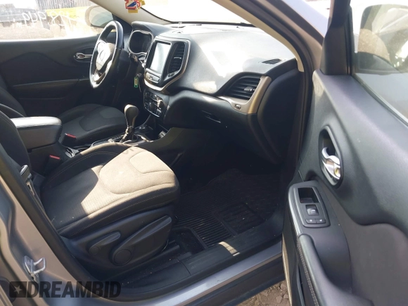 2016 Jeep Cherokee Altitude with VIN 1C4PJMCB0GW108819, listed as a IAAI auction lot 40198342 with 128,949 mi miles and . Bid and sale history available at DreamBid. Image 5.
