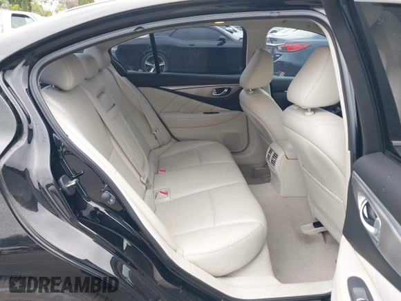 2015 Infiniti Q50 z VIN JN1BV7AP3FM336566, wystawiony jako IAAI lot #42349544 z przebiegiem 84 077 mil mil oraz . Historia ofert i sprzedaży dostępna na DreamBid. Obrazek 8.