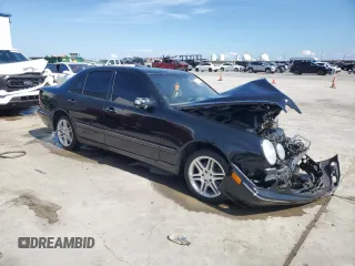 2001 Mercedes-Benz E-Class AWD with VIN WDBJF82J21X056553, listed as a Copart auction lot 73046694 with 0 mi miles and Salvage Title. Bid and sale history available at carsss.com. Image 4.