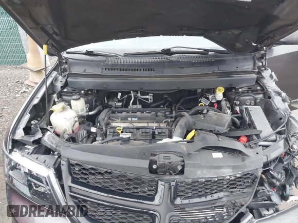 2020 Dodge Journey Crossroad z VIN 3C4PDCGB4LT271100, wystawiony jako IAAI lot #41552975 z przebiegiem 74 400 mil mil oraz . Historia ofert i sprzedaży dostępna na DreamBid. Obrazek 10.