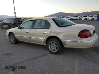 2000 Lincoln Continental with VIN 1LNHM97V0YY807253, listed as a Copart auction lot 80661834 with 130,398 mi miles and Salvage Title. Bid and sale history available at carsss.com. Image 2.
