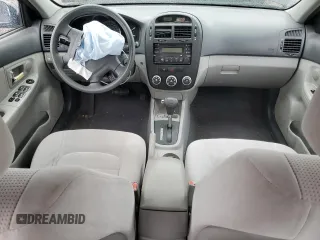 2009 Kia Spectra EX with VIN KNAFE222495648220, listed as a Copart auction lot 52886915 with 146,417 mi miles and Salvage title. Bid and sale history available at DreamBid. Image 8.