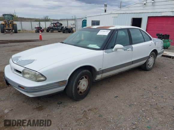 1993 Oldsmobile 88 z VIN 1G3HN53L0PH312824, wystawiony jako IAAI lot #42200714 z przebiegiem 152 810 mil mil oraz . Historia ofert i sprzedaży dostępna na DreamBid. Obrazek 2.