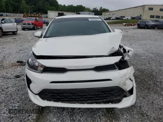 2023 Kia Rio LX z VIN 3KPA24AD6PE604127, wystawiony jako Copart lot #53955075 z przebiegiem 12 319 mil mil oraz Szkoda całkowita • Salvage title. Historia ofert i sprzedaży dostępna na DreamBid. Obrazek 5.