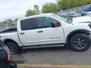 2014 Nissan Titan Pro-4X with VIN 1N6BA0ECXEN501915, listed as a IAAI auction lot 42097967 with 120,851 mi miles and . Bid and sale history available at DreamBid. Image 13.