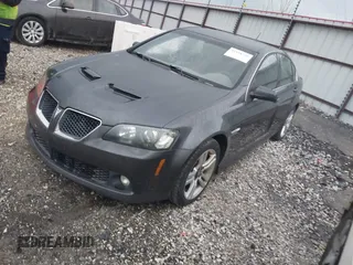 2009 Pontiac G8 with VIN 6G2ER577X9L185706, listed as a IAAI auction lot 41938748 with 150,648 mi miles. Bid and sale history available at carsss.com. Image 2.