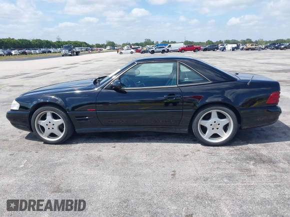 2001 Mercedes-Benz SL-Class with VIN WDBFA68F71F196390, listed as a IAAI auction lot 42128119 with 65,010 mi miles. Bid and sale history available at carsss.com. Image 14.