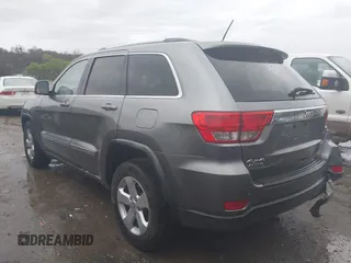 2012 Jeep Grand Cherokee Laredo with VIN 1C4RJFAG0CC156545, listed as a IAAI auction lot 41909296 with 170,033 mi miles. Bid and sale history available at carsss.com. Image 3.