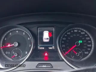 2018 Volkswagen Atlas SE z VIN 1V2LR2CA1JC515168, wystawiony jako IAAI lot #42024499 z przebiegiem 112 558 mil mil oraz . Historia ofert i sprzedaży dostępna na DreamBid. Obrazek 7.