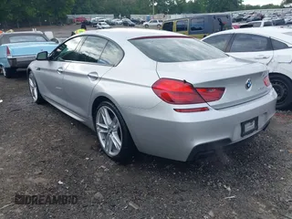2014 BMW 6 Series 650i z VIN WBA6B2C58ED129639, wystawiony jako IAAI lot #42171786 z przebiegiem 108 677 mil mil oraz . Historia ofert i sprzedaży dostępna na DreamBid. Obrazek 3.