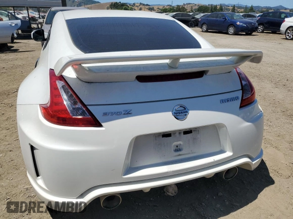 2011 Nissan 370Z Touring z VIN JN1AZ4EH7BM551606, wystawiony jako Copart lot #57173945 z przebiegiem Nie podano mil oraz Szkoda całkowita • Salvage title. Historia ofert i sprzedaży dostępna na DreamBid. Obrazek 6.
