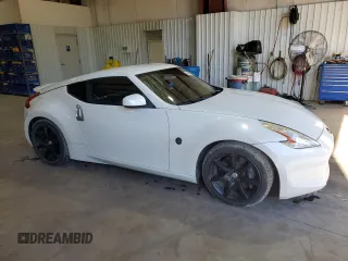 2010 Nissan 370Z Touring with VIN JN1AZ4EH8AM505975, listed as a Copart auction lot 80635634 with 107,404 mi miles and Salvage Title. Bid and sale history available at carsss.com. Image 4.