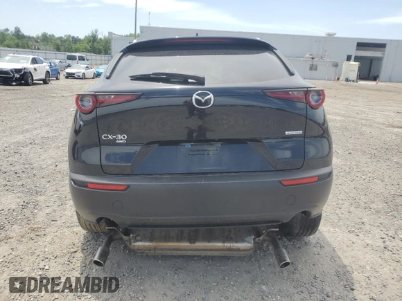 2022 Mazda CX-30 S Premium with VIN 3MVDMBDL2NM428998, listed as a Copart auction lot 57803465 with 49,090 mi miles and Salvage title. Bid and sale history available at DreamBid. Image 6.