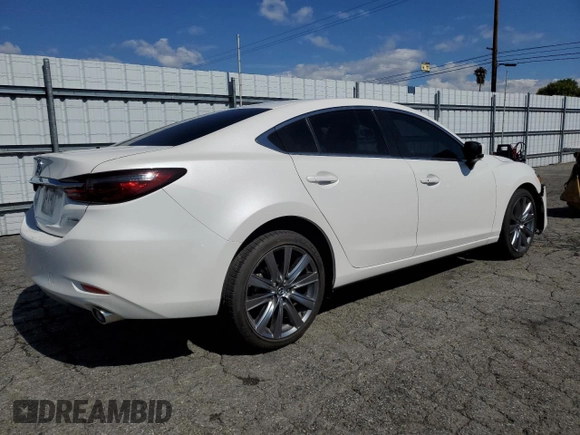 2021 Mazda 6 Touring with VIN JM1GL1VM0M1612027, listed as a Copart auction lot 48262185 with 67,568 mi miles and Salvage Title. Bid and sale history available at DreamBid. Image 3.