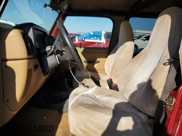 1998 Jeep Wrangler SE with VIN 1J4FY29P7WP792463, listed as a Copart auction lot 72254154 with 179,114 mi miles and Salvage Title. Bid and sale history available at carsss.com. Image 7.