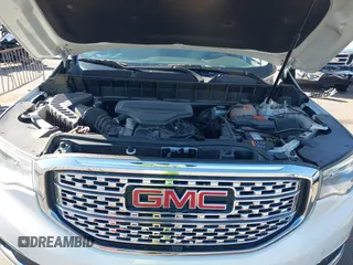 2019 GMC Acadia Denali with VIN 1GKKNPLS9KZ166469, listed as a IAAI auction lot 41857034 with 53,721 mi miles and . Bid and sale history available at carsss.com. Image 10.