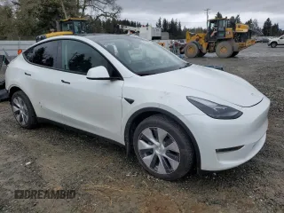 2023 Tesla Model Y Long Range z VIN 7SAYGDEE4PF836872, wystawiony jako Copart lot #45566235 z przebiegiem 7 674 mil mil oraz Szkoda całkowita • Salvage title. Historia ofert i sprzedaży dostępna na DreamBid. Obrazek 4.