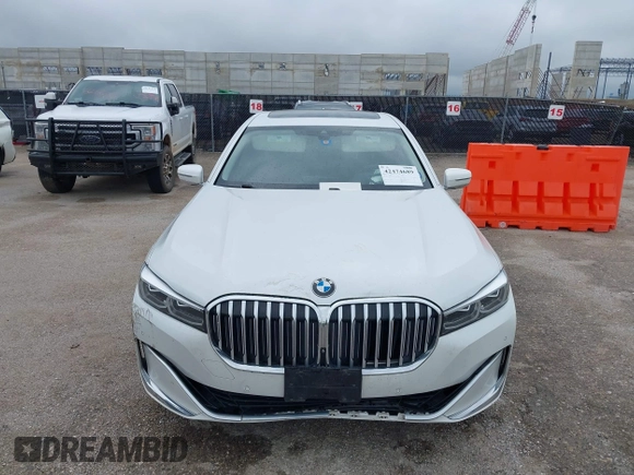 2020 BMW 7 Series 740i z VIN WBA7T2C07LCE11573, wystawiony jako IAAI lot #42474689 z przebiegiem 63 015 mil mil oraz . Historia ofert i sprzedaży dostępna na DreamBid. Obrazek 12.
