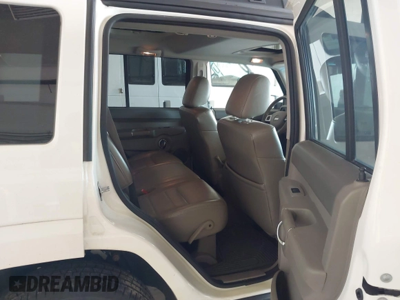 2010 Jeep Commander Sport with VIN 1J4RG4GT7AC130135, listed as a IAAI auction lot 42436053 with 103,482 mi miles and . Bid and sale history available at DreamBid. Image 8.