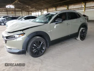 2024 Mazda CX-30 2.5 Carbon Turbo with VIN 3MVDMBXY5RM710162, listed as a Copart auction lot 82558204 with 1,085 mi miles and Salvage Title. Bid and sale history available at carsss.com. Image 1.