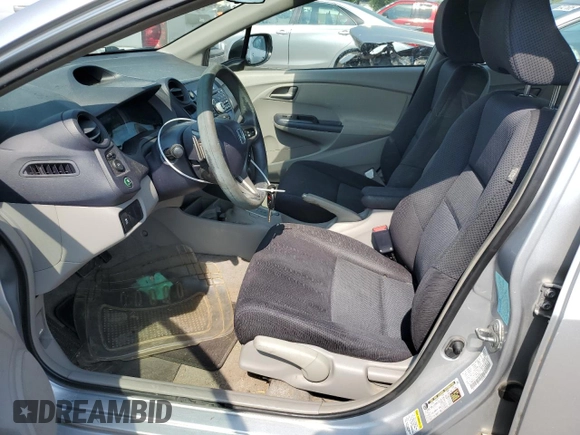 2010 Honda Insight EX with VIN JHMZE2H77AS015329, listed as a Copart auction lot 60502835 with 213,397 mi miles and Clean title. Bid and sale history available at DreamBid. Image 7.