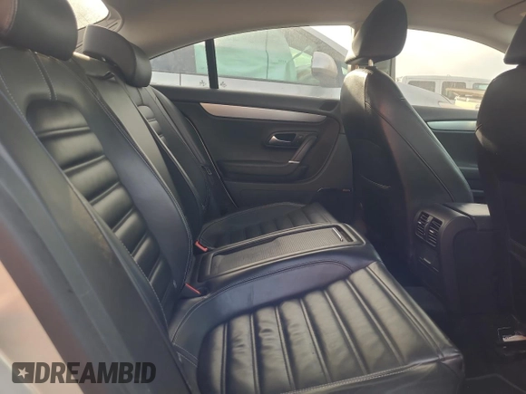 2009 Volkswagen CC 4Motion with VIN WVWGU73C29E548552, listed as a Copart auction lot 38075104 with 123,781 mi miles and Salvage Title. Bid and sale history available at carsss.com. Image 10.