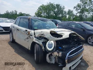 2020 MINI Hardtop 4 Door Cooper S z VIN WMWXU9C04L2M07490, wystawiony jako IAAI lot #42411682 z przebiegiem 41 772 mil mil oraz . Historia ofert i sprzedaży dostępna na DreamBid. Obrazek 1.