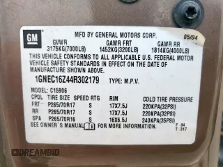 2004 Chevrolet Suburban LT z VIN 1GNEC16Z44R302179, wystawiony jako Copart lot #57956605 z przebiegiem 291 567 mil mil oraz Szkoda całkowita • Salvage title. Historia ofert i sprzedaży dostępna na DreamBid. Obrazek 13.