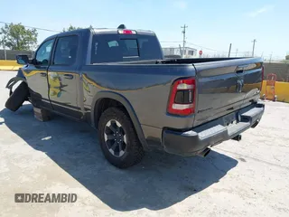 2020 Ram 1500 Rebel with VIN 1C6SRFLT8LN164196, listed as a IAAI auction lot 42538059 with 60,520 mi miles and . Bid and sale history available at DreamBid. Image 3.