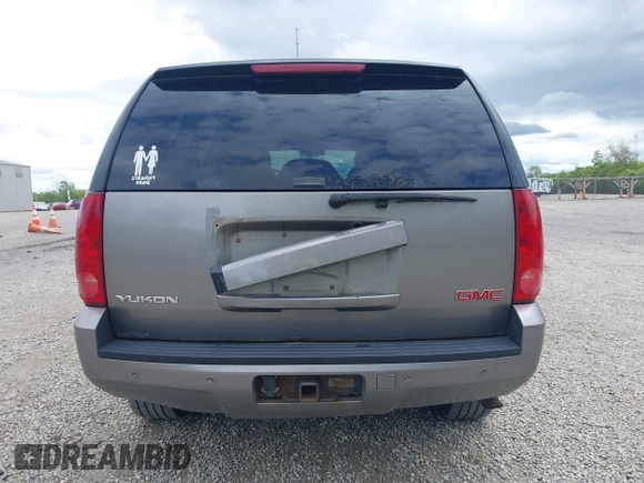 2007 GMC Yukon SLT z VIN 1GKFK13077R129885, wystawiony jako IAAI lot #42184207 z przebiegiem 264 848 mil mil oraz . Historia ofert i sprzedaży dostępna na DreamBid. Obrazek 16.