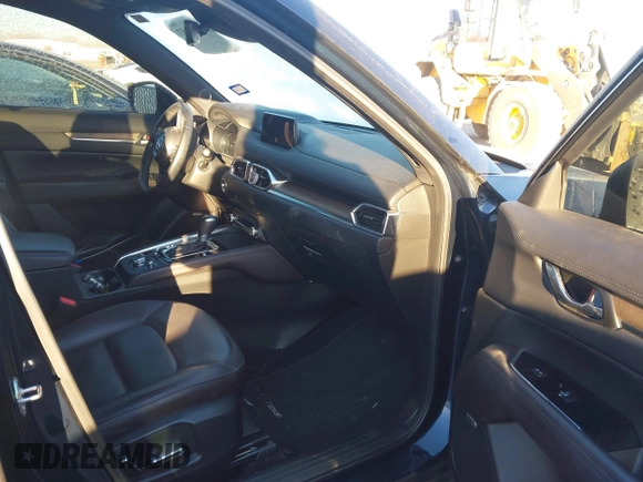 2019 Mazda CX-5 Signature with VIN JM3KFBEY5K0656965, listed as a IAAI auction lot 41421453 with 99,073 mi miles. Bid and sale history available at carsss.com. Image 5.