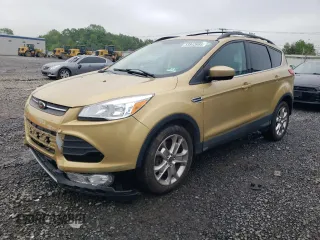 2014 Ford Escape SE z VIN 1FMCU9GX2EUC14847, wystawiony jako Copart lot #55843985 z przebiegiem 86 226 mil mil oraz Szkoda całkowita • Salvage title. Historia ofert i sprzedaży dostępna na DreamBid. Obrazek 1.