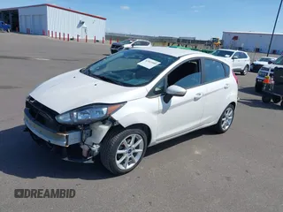 2016 Ford Fiesta SE with VIN 3FADP4EJ6GM170303, listed as a IAAI auction lot 42045585 with 121,162 mi miles. Bid and sale history available at carsss.com. Image 2.