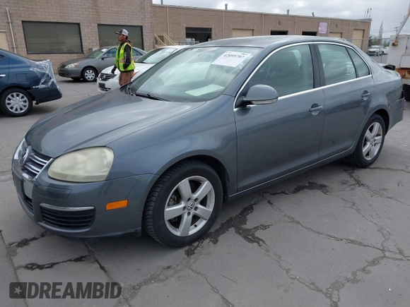 2009 Volkswagen Jetta Sedan SE with VIN 3VWRZ71K49M084983, listed as a IAAI auction lot 42095707 with 154,691 mi miles. Bid and sale history available at carsss.com. Image 17.