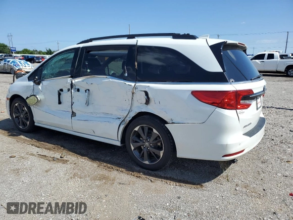 2022 Honda Odyssey Elite with VIN 5FNRL6H91NB022604, listed as a Copart auction lot 60165615 with 51,557 mi miles and Salvage title. Bid and sale history available at DreamBid. Image 2.