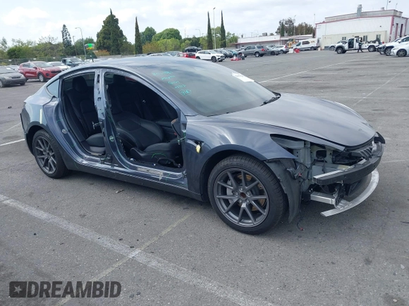 2023 Tesla Model 3 with VIN 5YJ3E1EA4PF410060, listed as a IAAI auction lot 42067624 with 59,934 mi miles and . Bid and sale history available at DreamBid. Image 1.