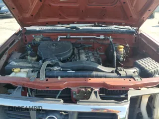 2000 Nissan Frontier XE with VIN 1N6DD26SXYC393054, listed as a Copart auction lot 62410125 with 106,319 mi miles and Salvage title. Bid and sale history available at DreamBid. Image 11.