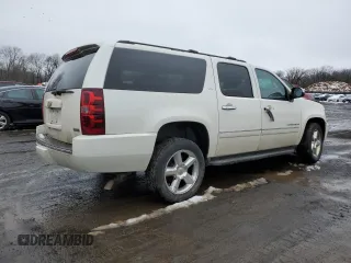 2012 Chevrolet Suburban LTZ with VIN 1GNSKKE77CR326213, listed as a Copart auction lot 44882115 with 132,842 mi miles and Salvage Title. Bid and sale history available at carsss.com. Image 3.