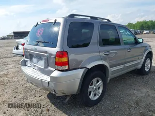 2007 Ford Escape Hybrid with VIN 1FMCU49H47KA90605, listed as a IAAI auction lot 42093591 with 136,924 mi miles and . Bid and sale history available at DreamBid. Image 4.