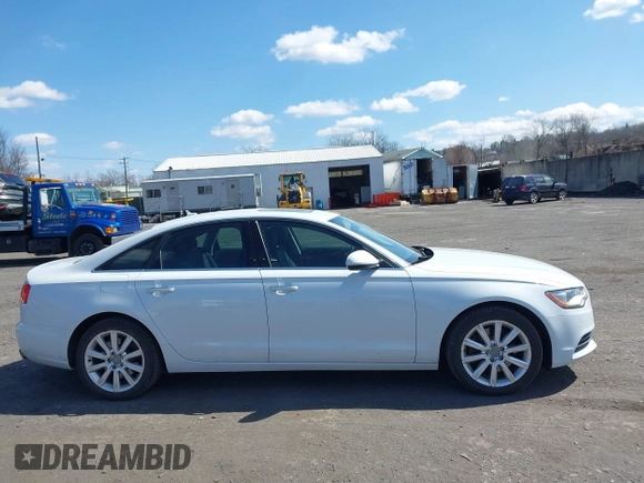 2015 Audi A6 2.0T Premium Plus with VIN WAUGFAFC7FN025958, listed as a IAAI auction lot 41888489 with 100,600 mi miles. Bid and sale history available at carsss.com. Image 13.