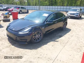 2018 Tesla Model 3 Long Range Battery with VIN 5YJ3E1EB1JF122786, listed as a IAAI auction lot 42010451 with 85,510 mi miles and . Bid and sale history available at DreamBid. Image 19.
