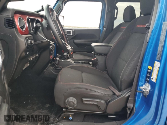 2021 Jeep Gladiator Rubicon with VIN 1C6JJTBM1ML611203, listed as a Copart auction lot 87203924 with 27,645 mi miles and Salvage title. Bid and sale history available at DreamBid. Image 7.