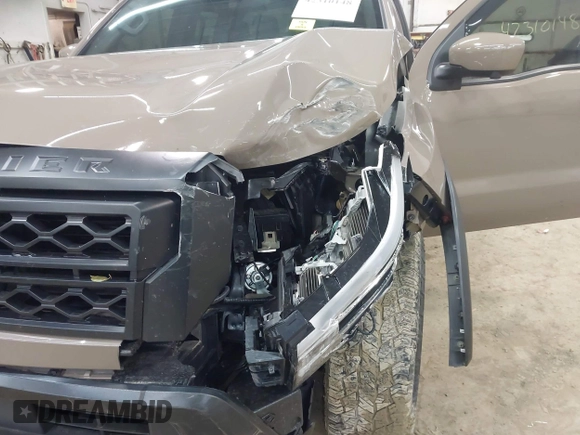 2024 Nissan Frontier SV with VIN 1N6ED1EK8RN613989, listed as a IAAI auction lot 42310148 with 14,202 mi miles and . Bid and sale history available at DreamBid. Image 6.