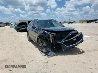 2020 Cadillac XT4 FWD Sport z VIN 1GYFZER40LF129760, wystawiony jako Copart lot #62592775 z przebiegiem 20 822 mil mil oraz Szkoda całkowita • Salvage title. Historia ofert i sprzedaży dostępna na DreamBid. Obrazek 15.